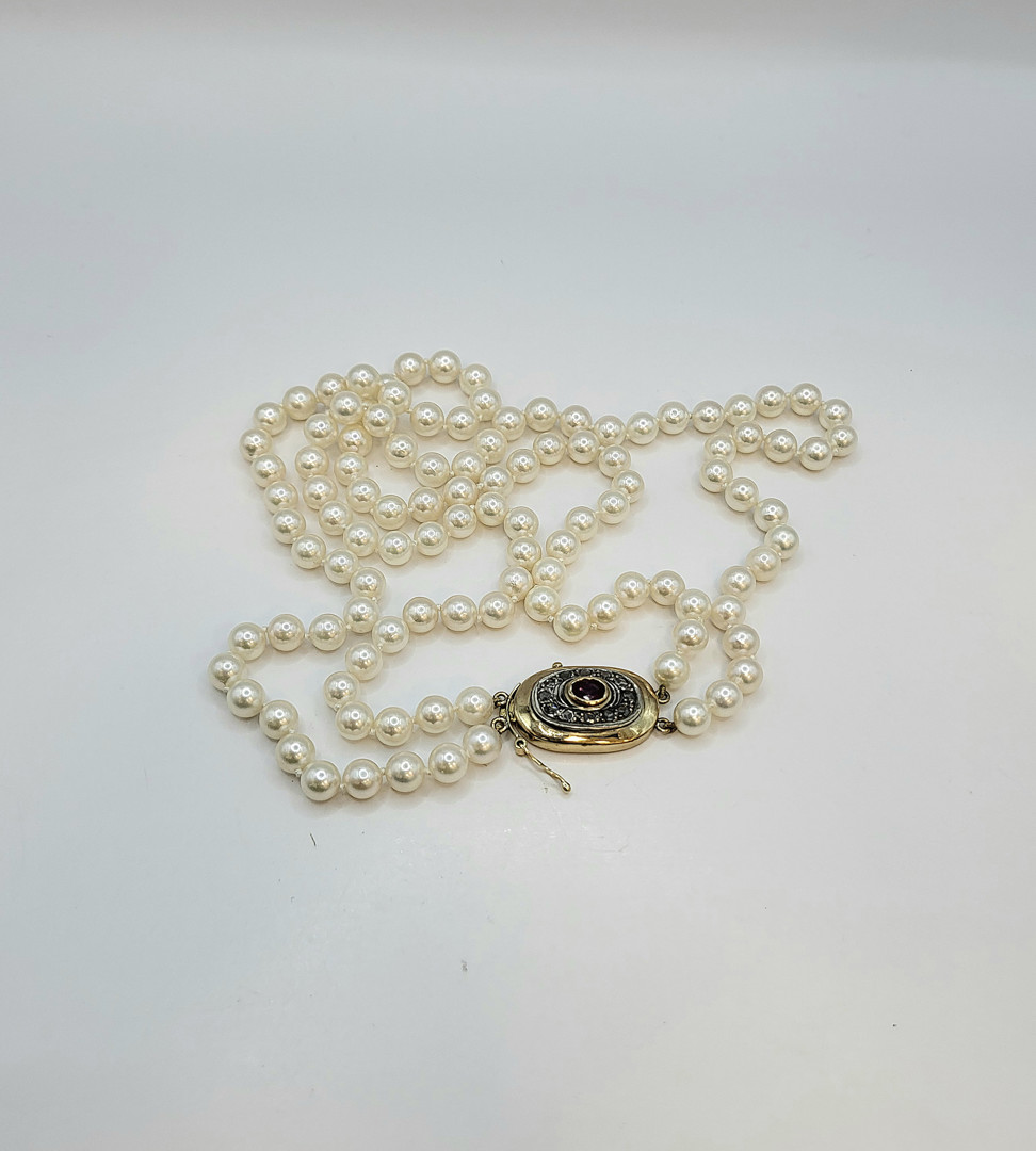Collana perle oro pietra diamanti