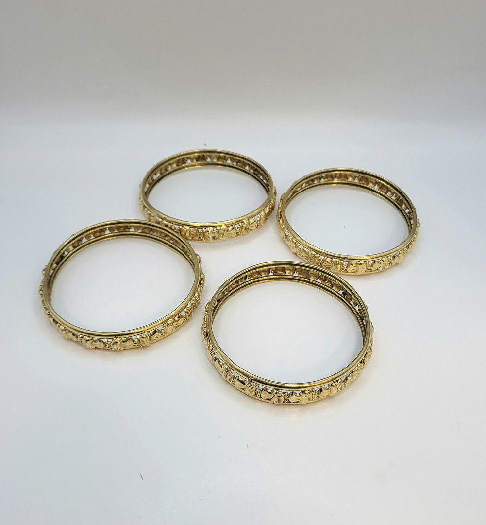 Quattro bracciali oro