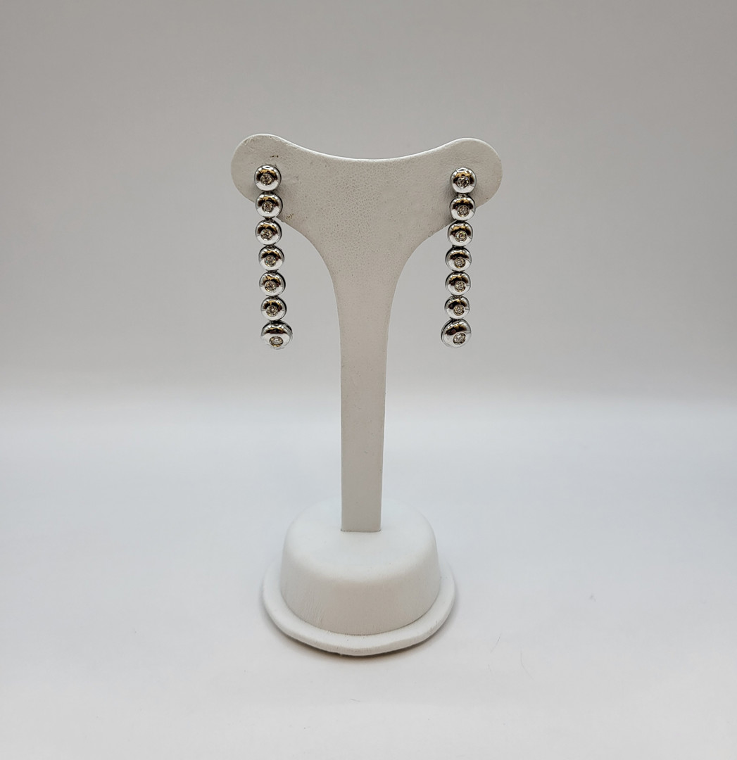 Paio orecchini oro diamantini