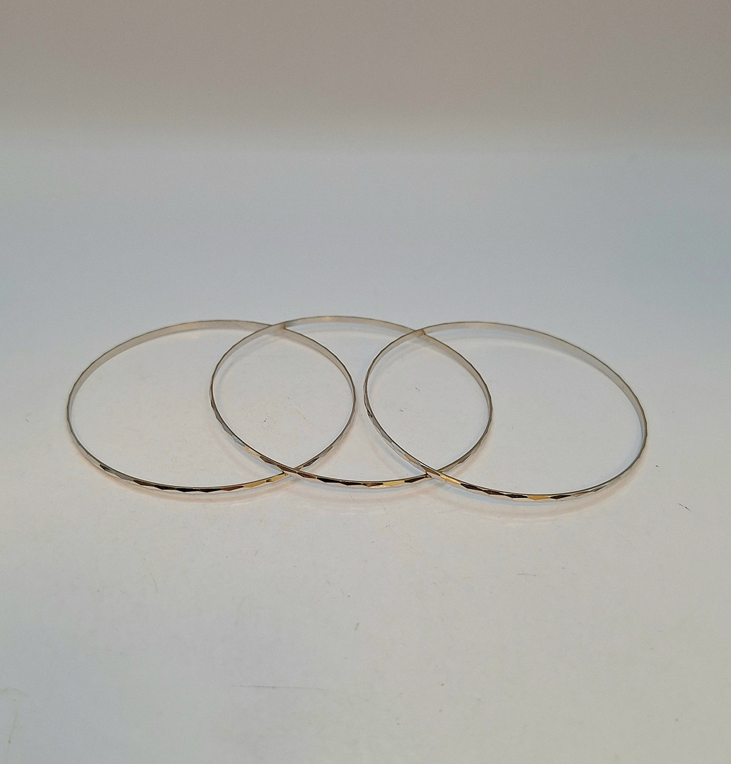 Tre bracciali oro
