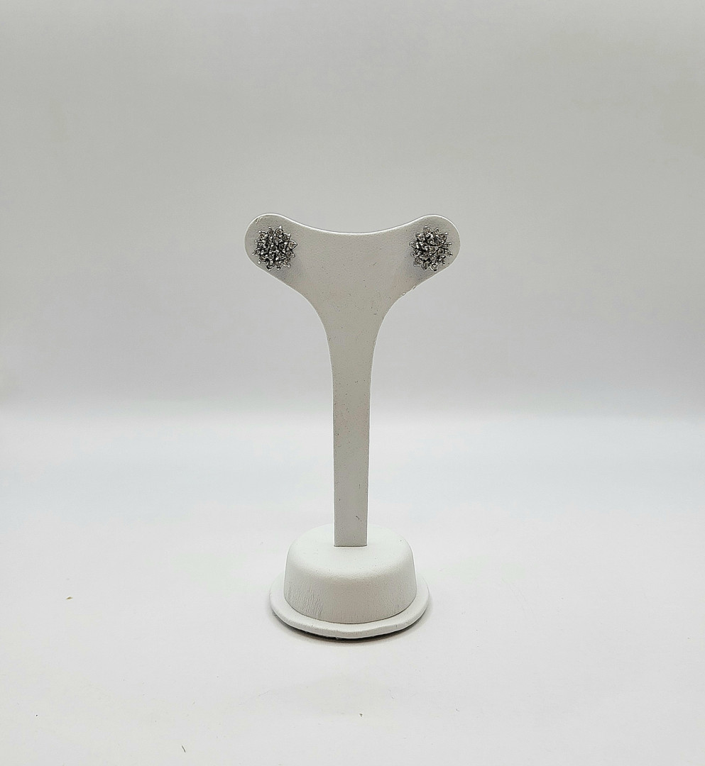 Un paio orecchini oro diamantini 