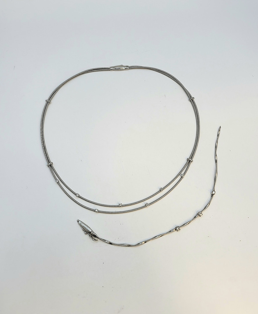 Collana e bracciale a firma Marco Bicego oro diamantini 