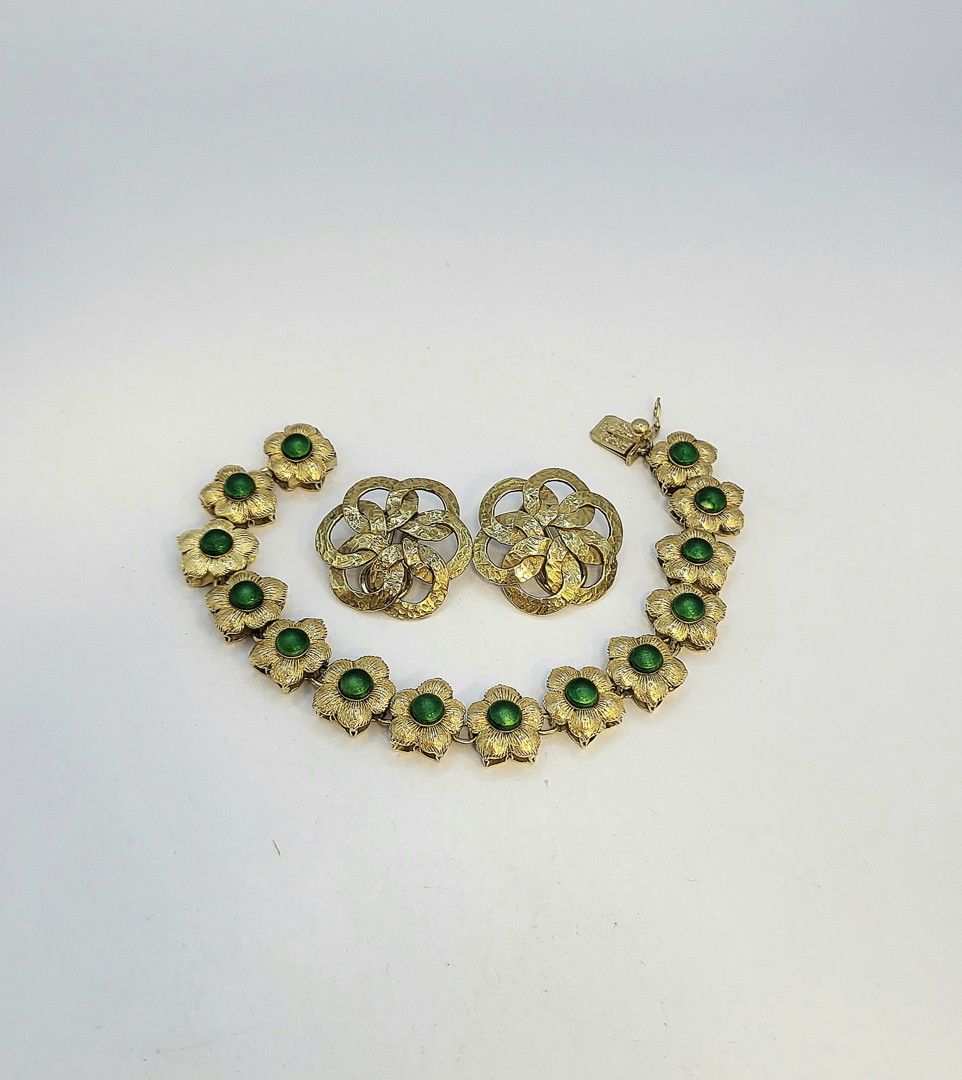 Braccialetto e un paio orecchini oro 