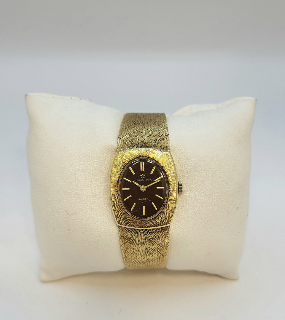 Bracciale con orologio oro