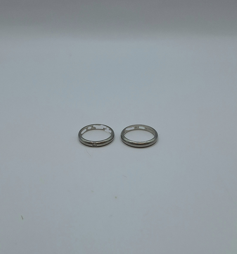 Due anelli a firma Cartier platino diamantino