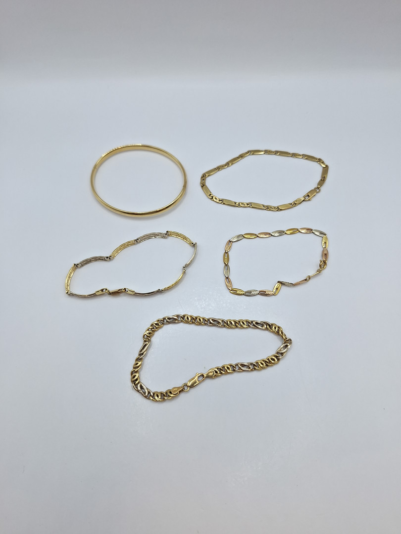Cinque bracciali oro 