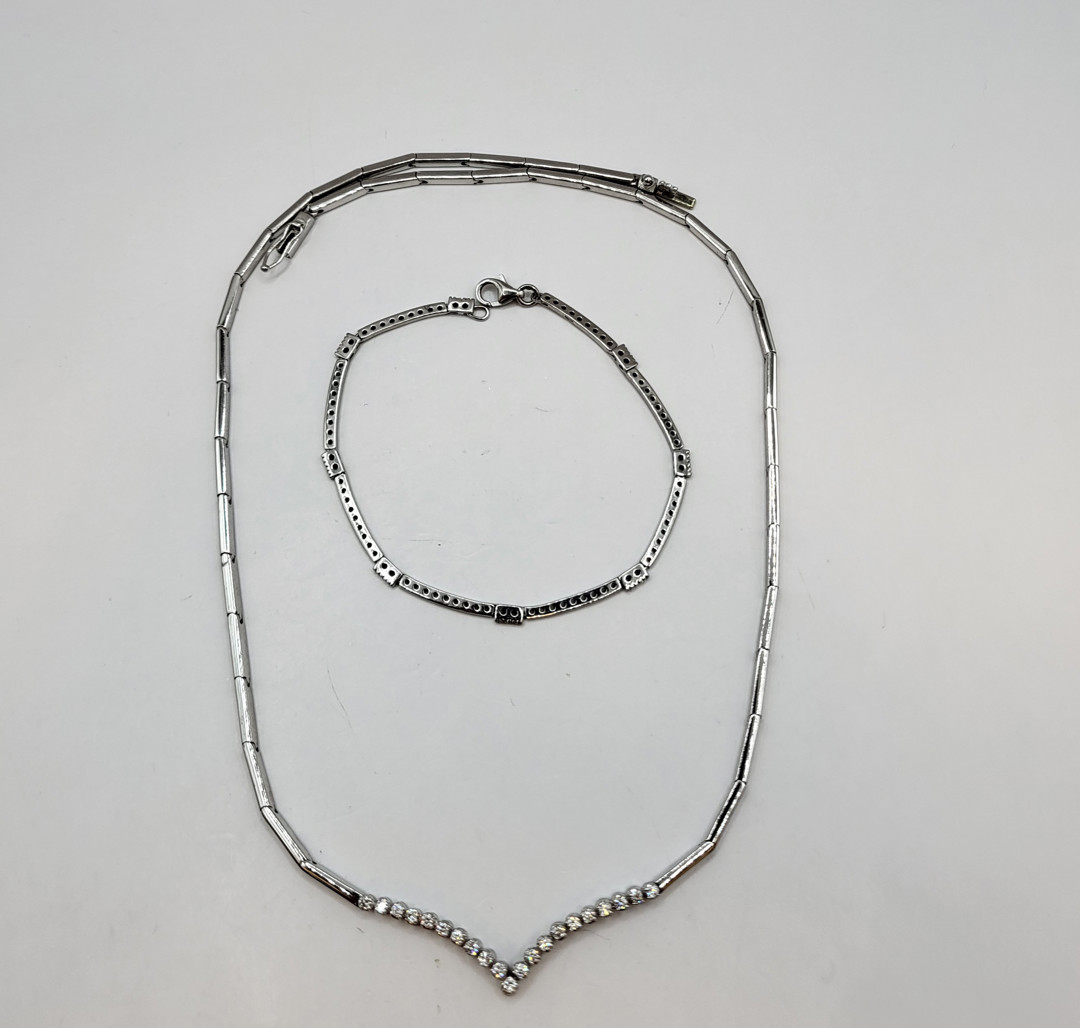 Collana e bracciale oro pietre