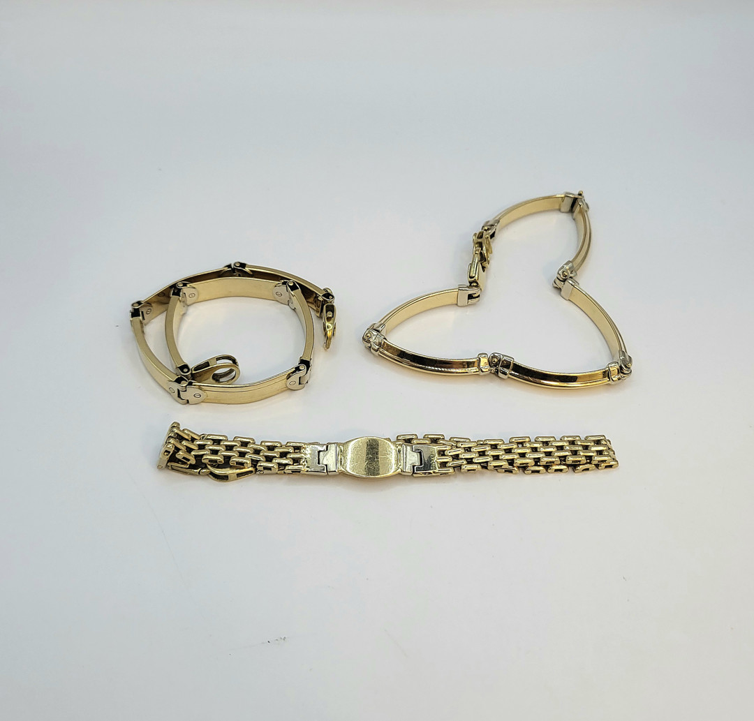 Tre bracciali oro