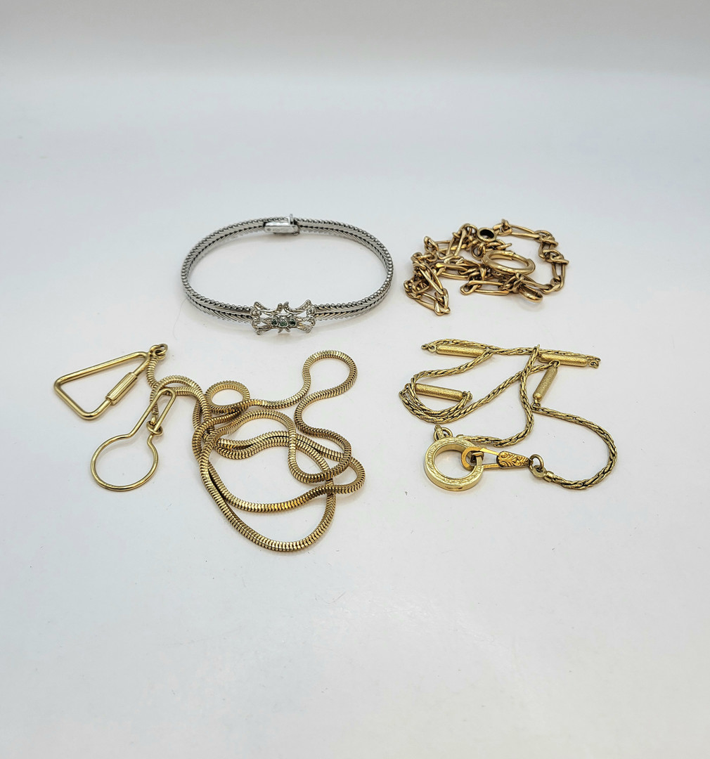 Vari oggetti oro pietre