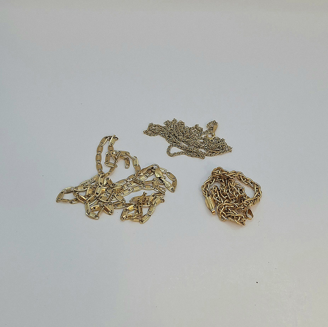 Due collane e bracciale oro