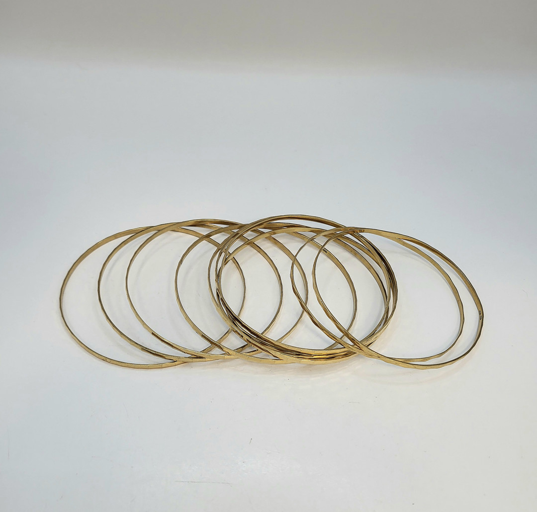 Dieci bracciali oro 