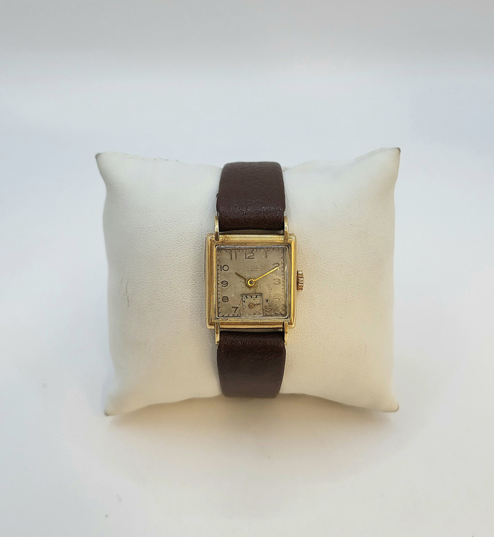 Orologio oro metallo cinturino pelle