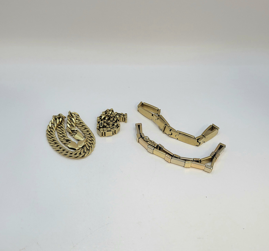 Quattro bracciali oro