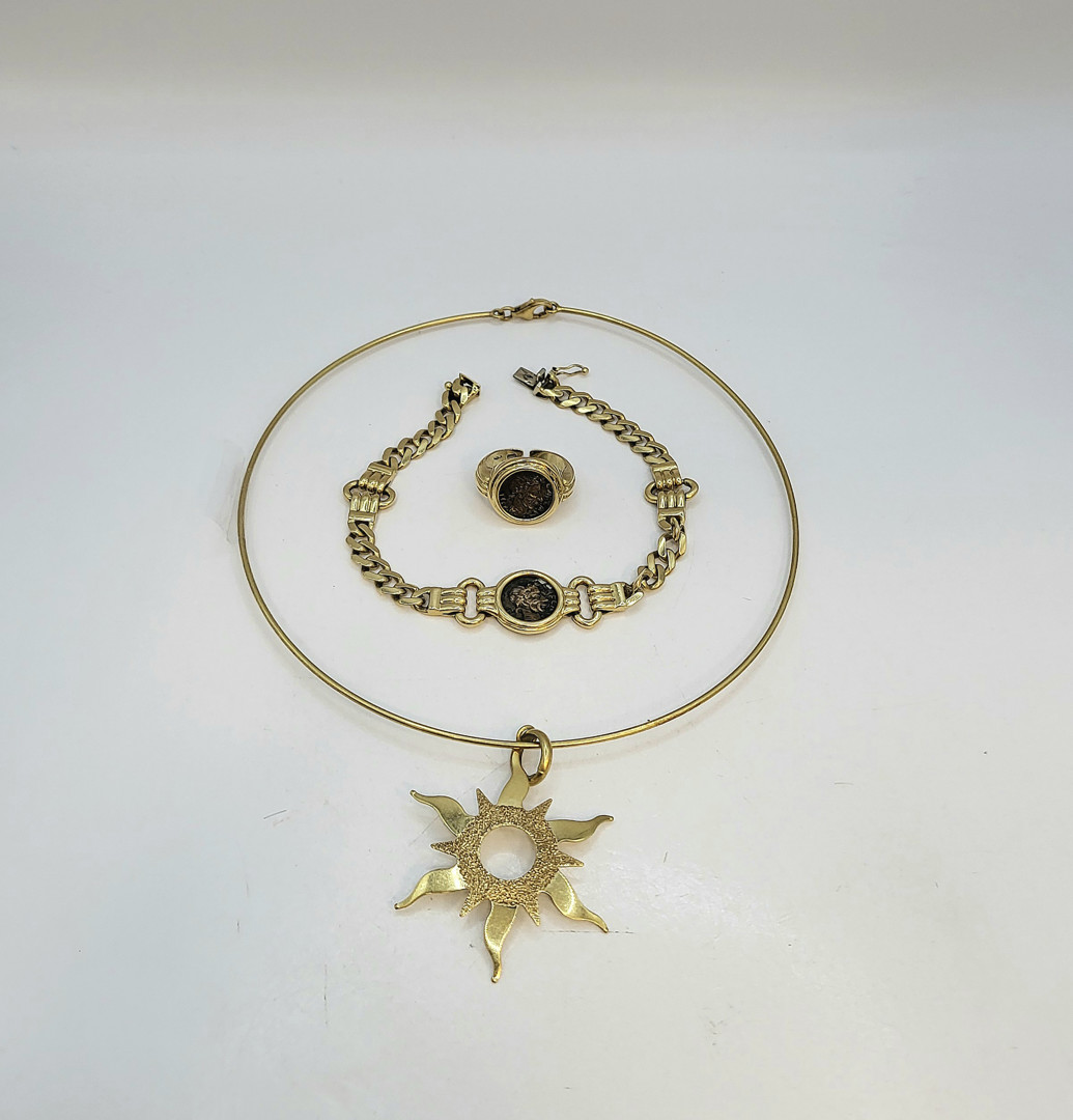 Collana ciondolo bracciale e anello oro