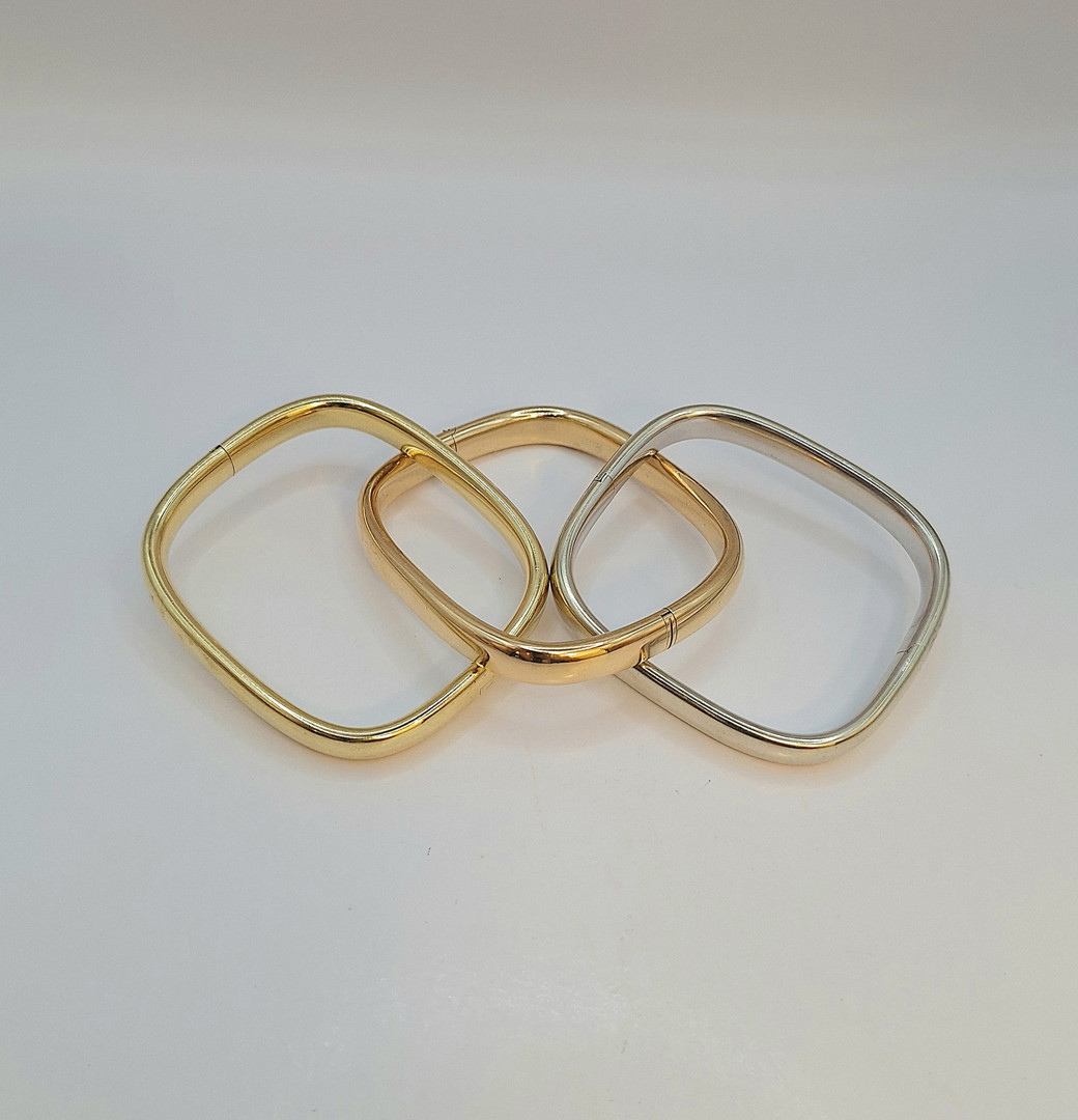 Tre bracciali oro