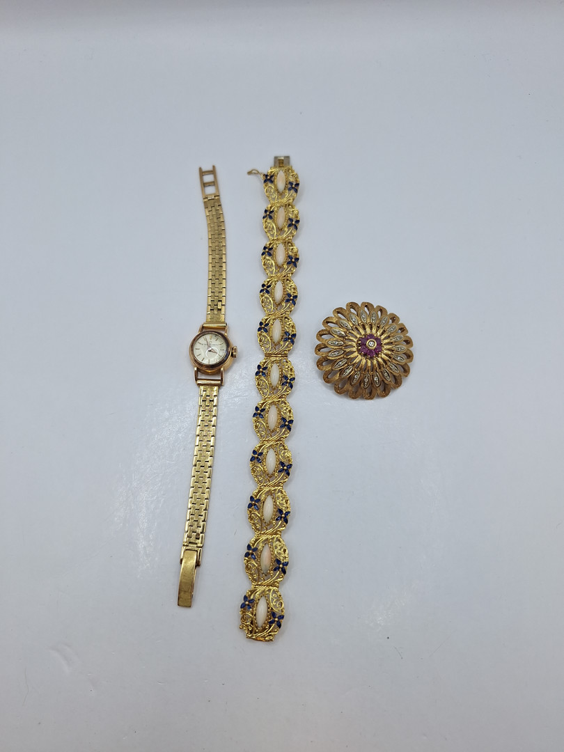 Vari oggetti oro smalti pietre diamantini