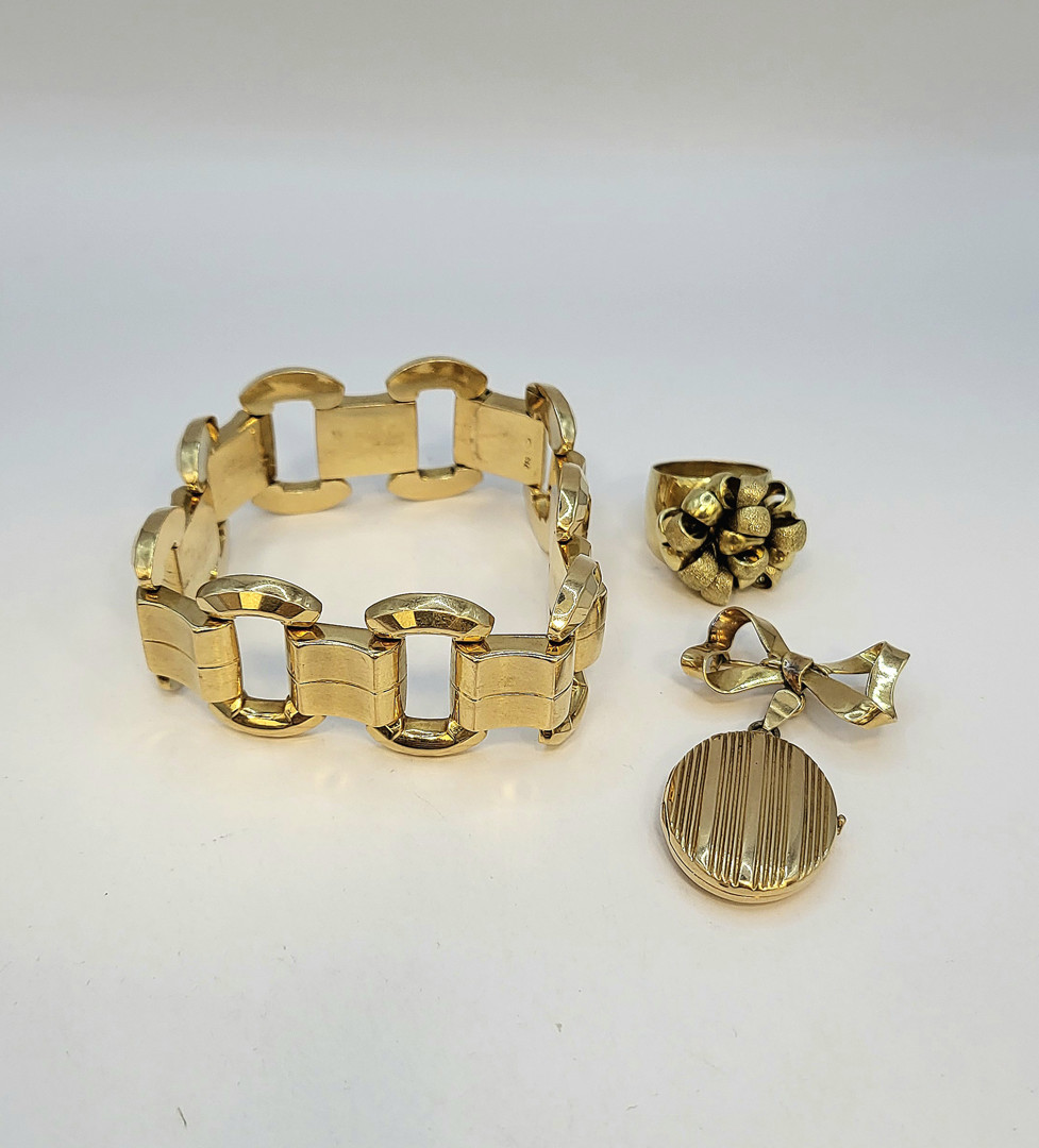 Bracciale spilla e anello oro 