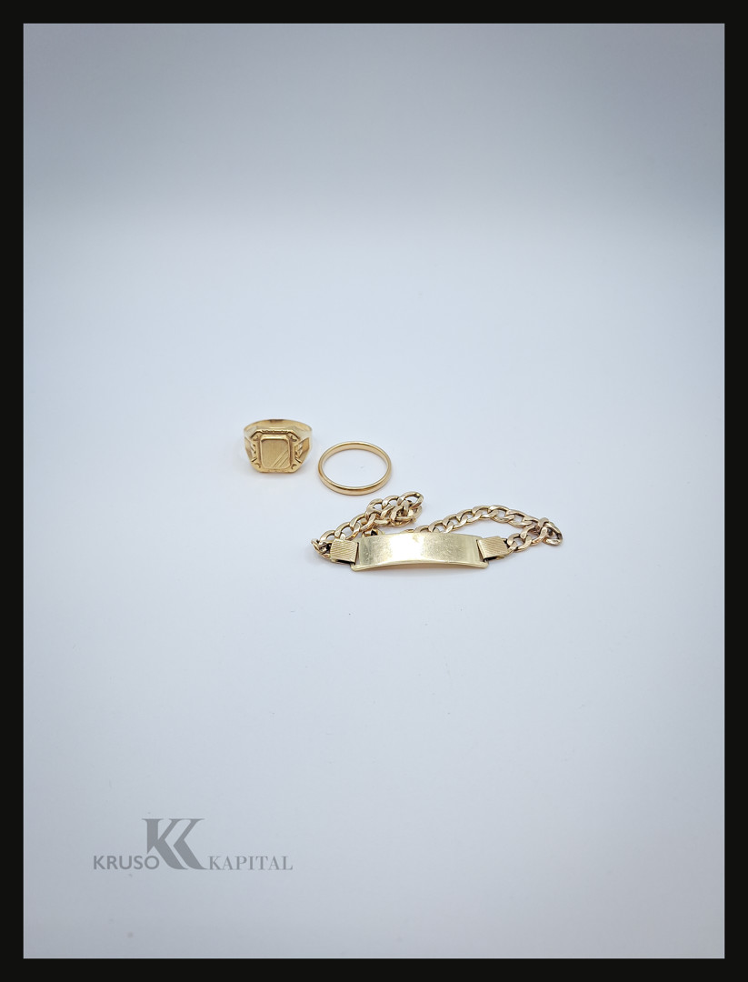 Due anelli e bracciale oro 