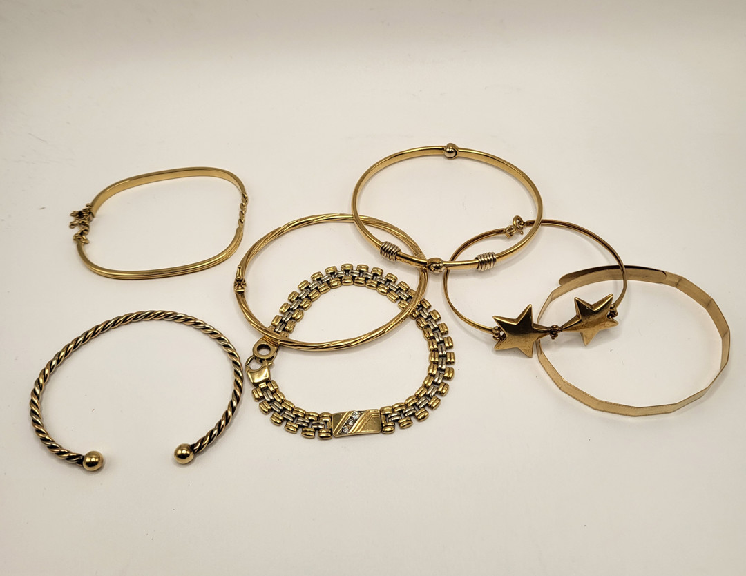 Sette bracciali oro diamantini 