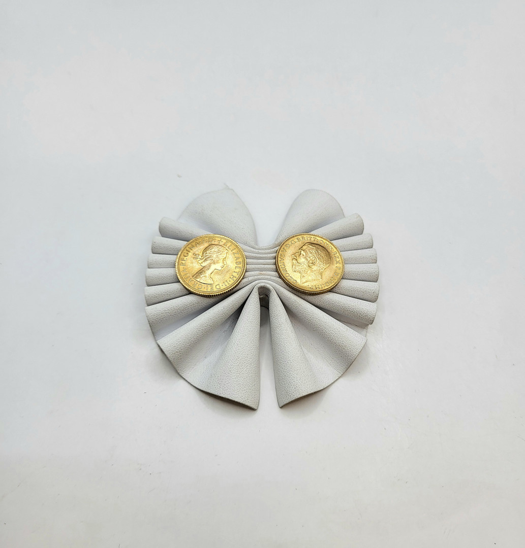 Due pezzi oro monetato