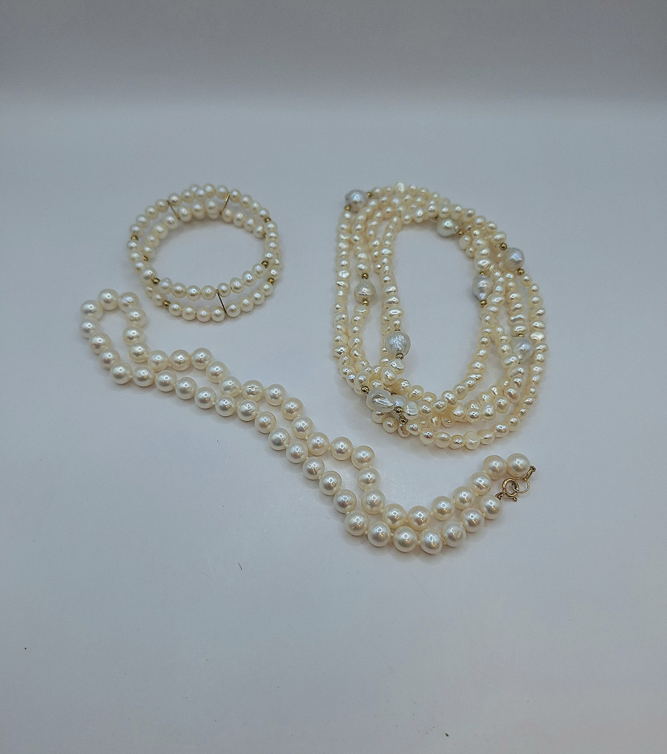 Vari oggetti perle oro