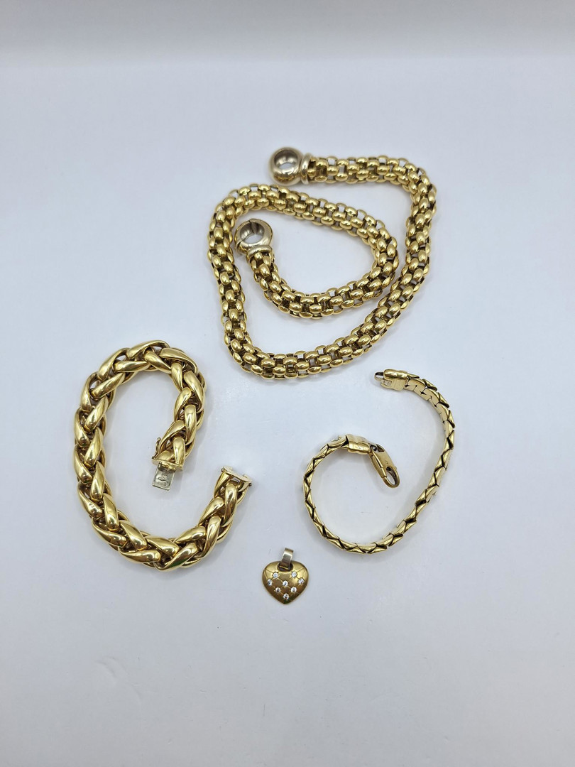 Collana due bracciali e pendente in oro pietre 