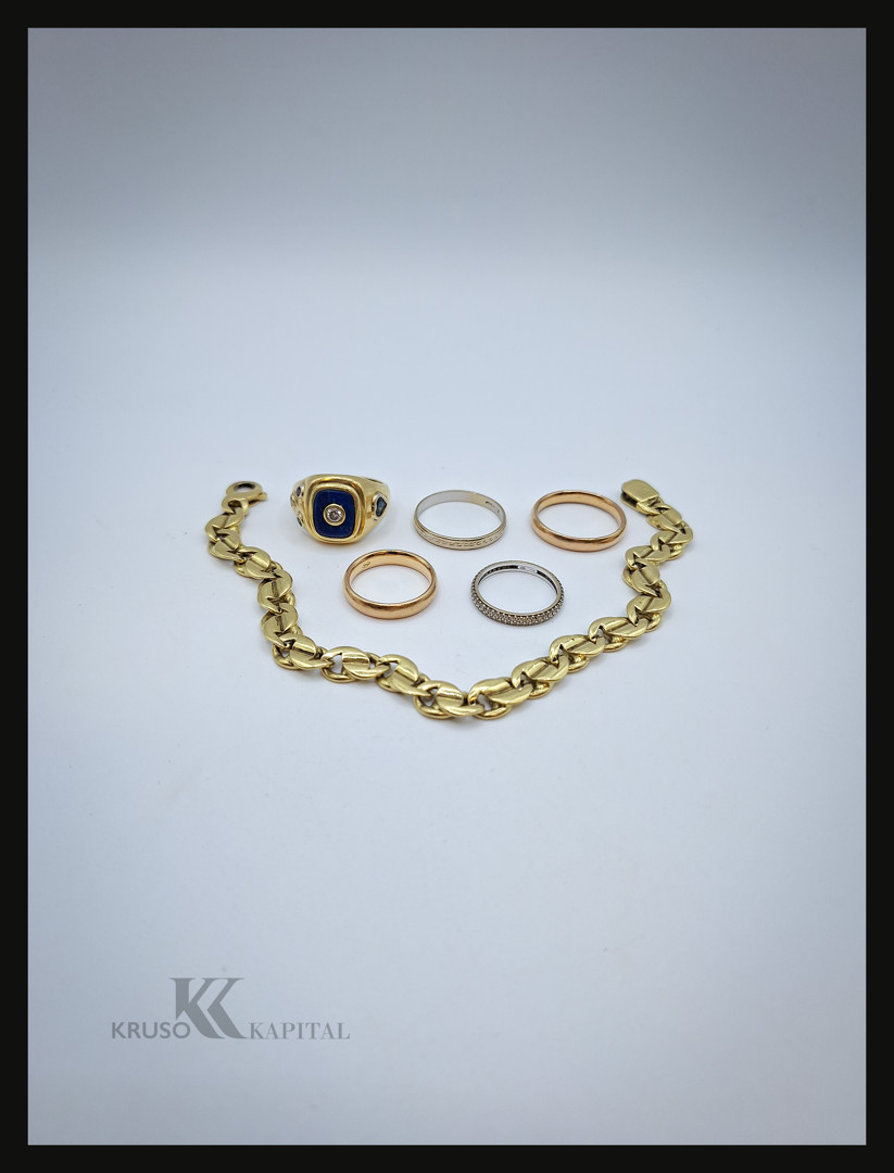 Bracciale cinque anelli oro diamantini pietre