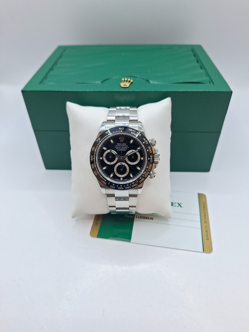 Cronografo acciaio ghiera ceramica Rolex Daytona scatola e garanzia a corredo