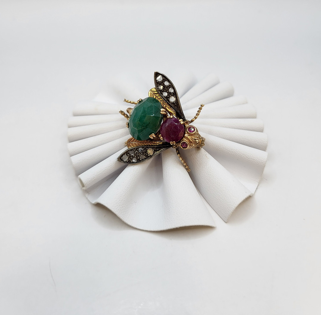 Spilla oro argento pietre diamantini