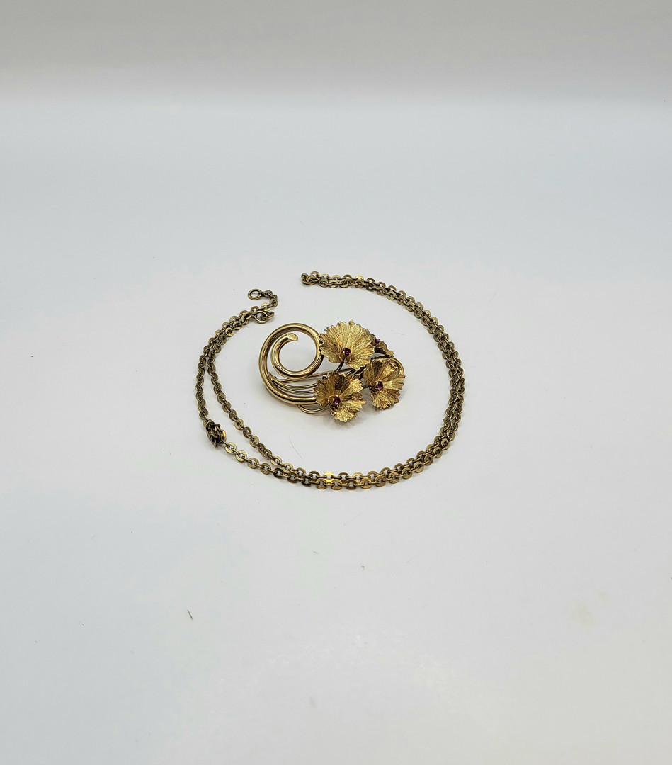 Collana e spilla oro pietre