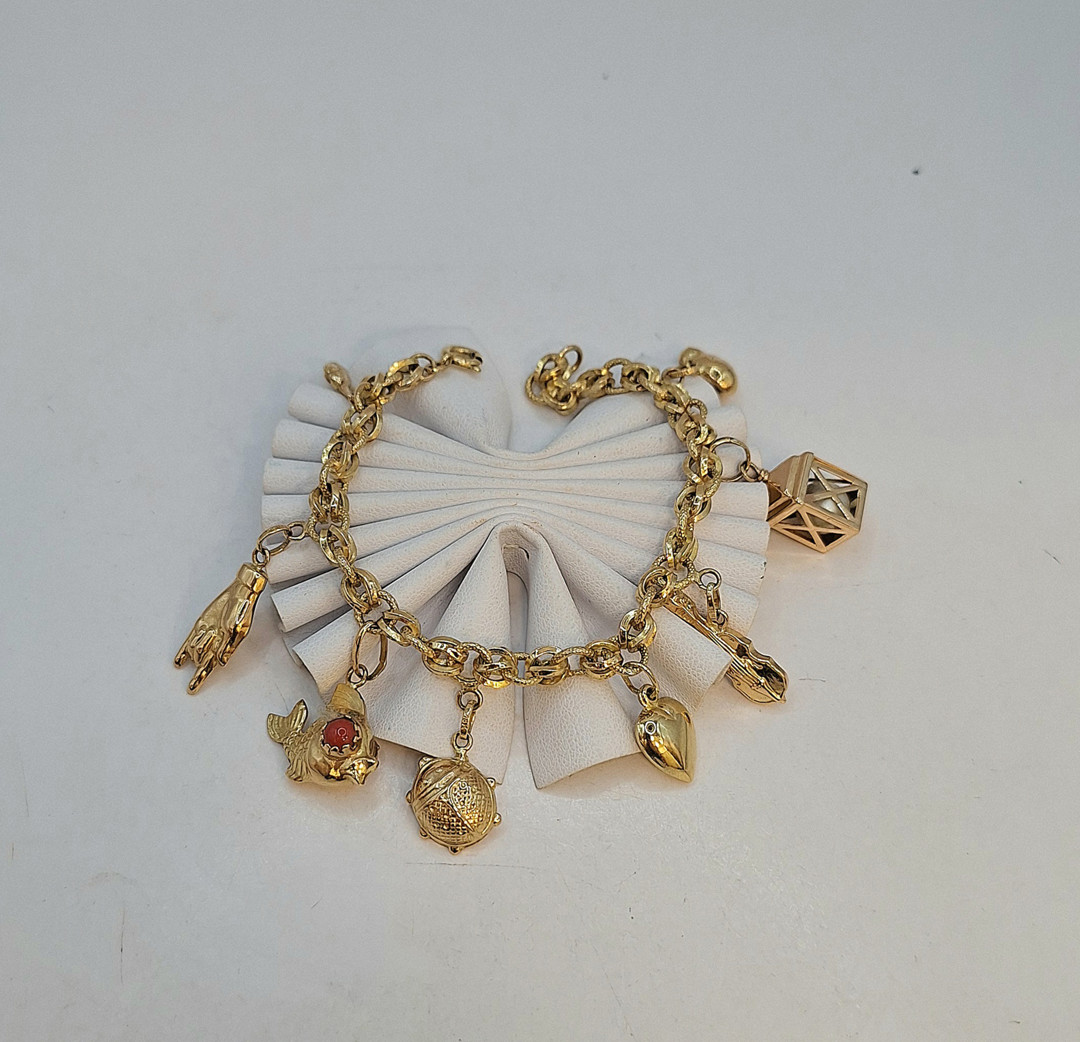 Bracciale con ciondoli oro perla pietre