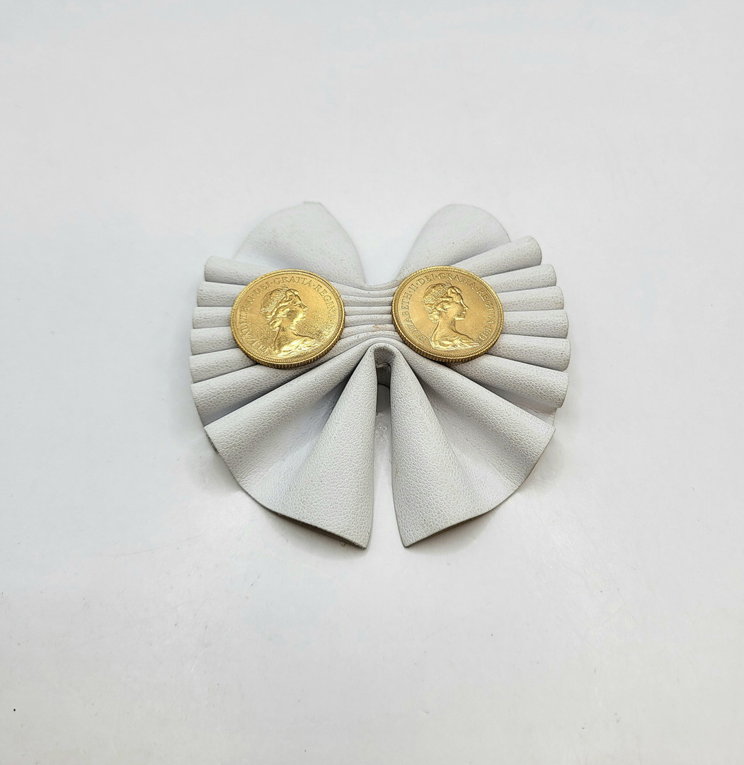 Due pezzi oro monetato