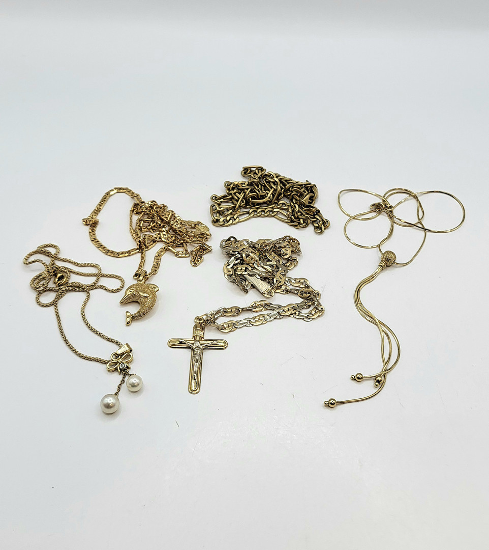 Vari oggetti oro perle diamantino