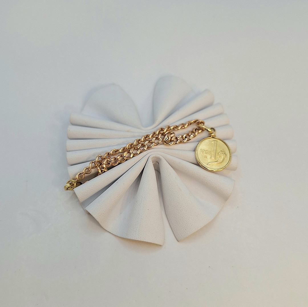 Bracciale e ciondolo oro