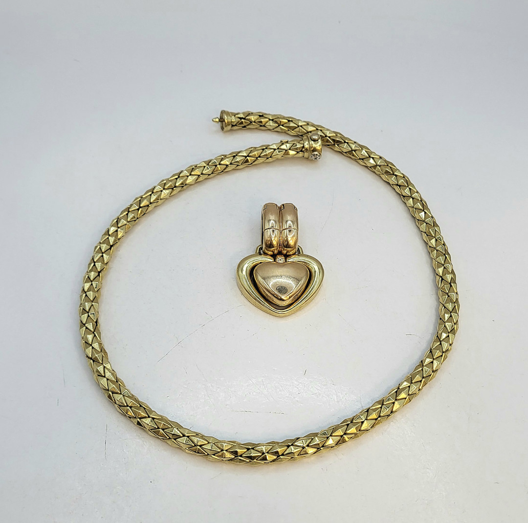 Collana a firma Chimento con ciondolo oro