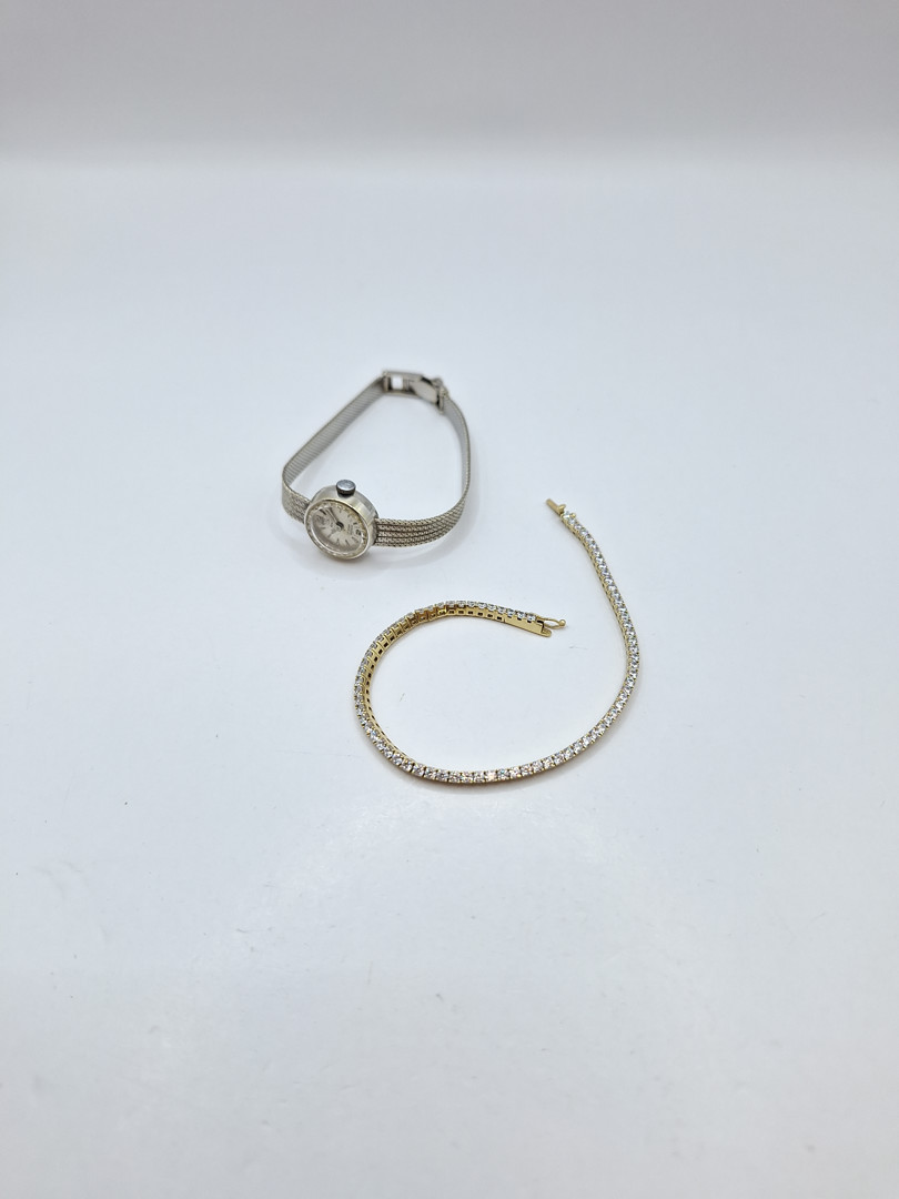 Orologio e bracciale in oro pietre