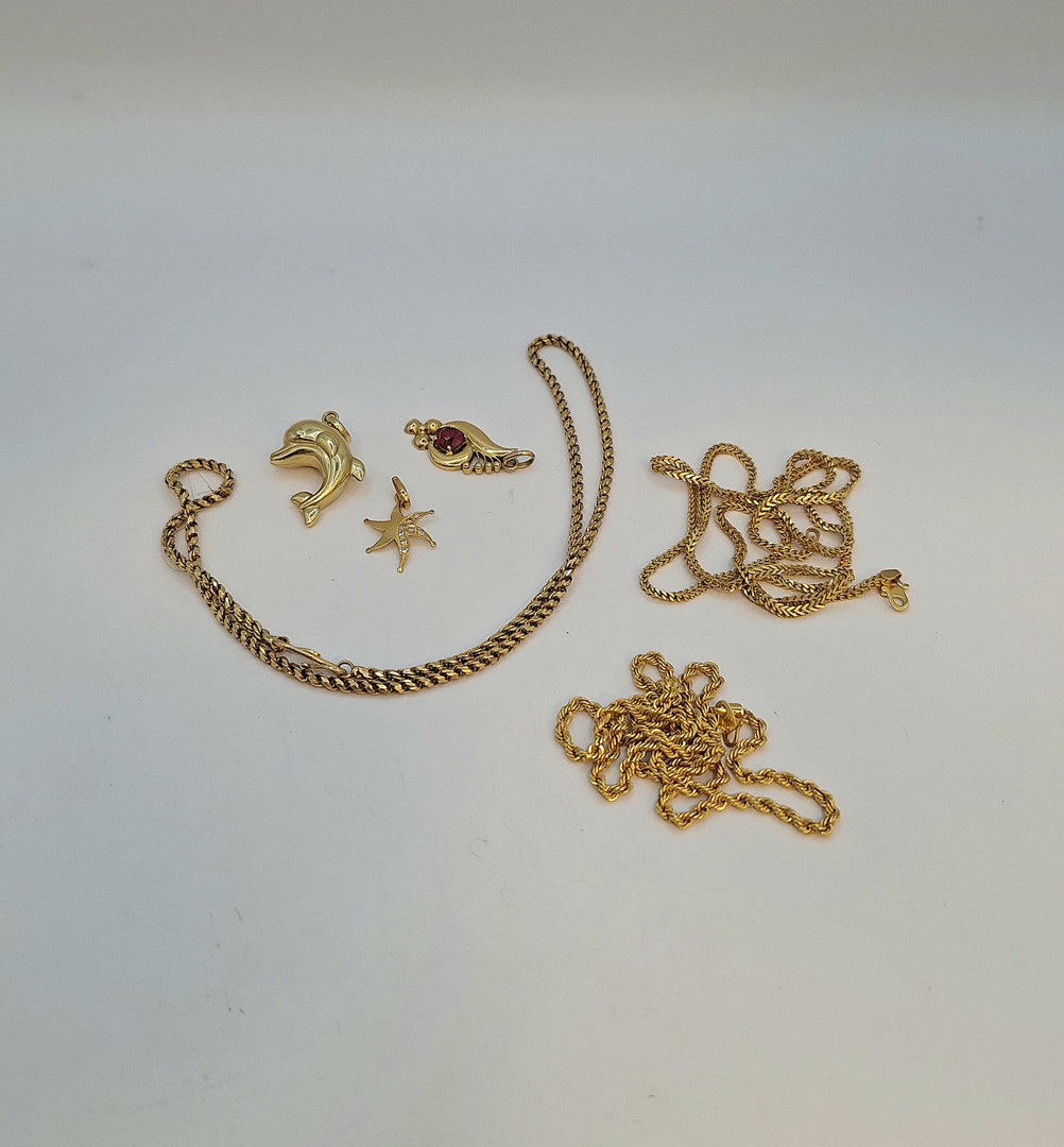 Vari oggetti oro pietre 