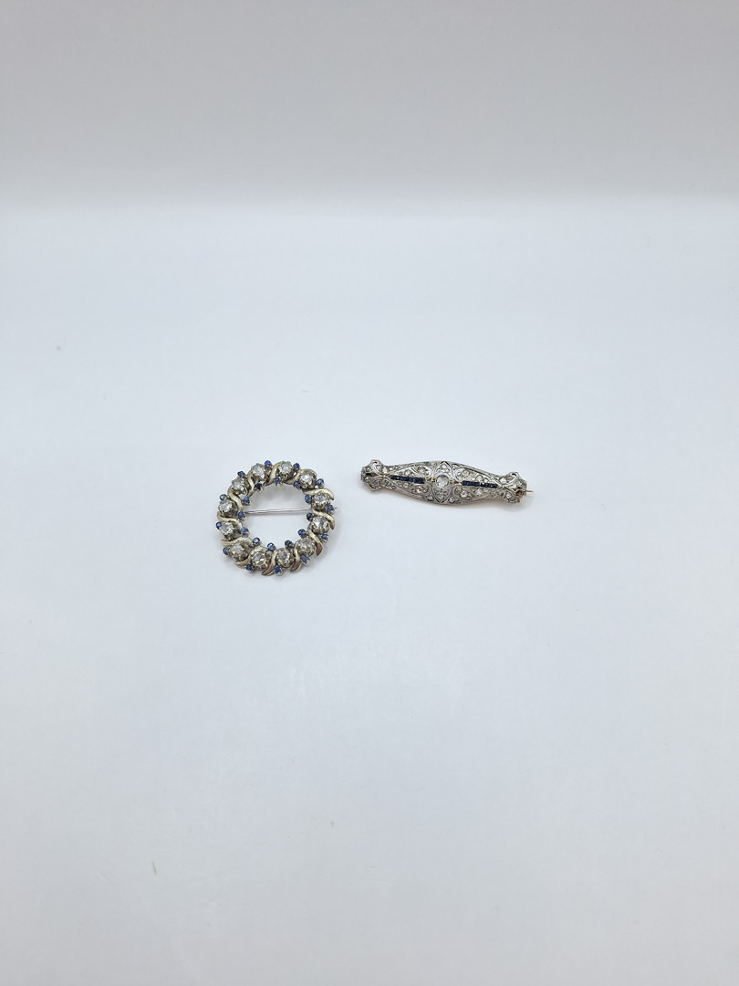 Due spille oro pietre diamanti