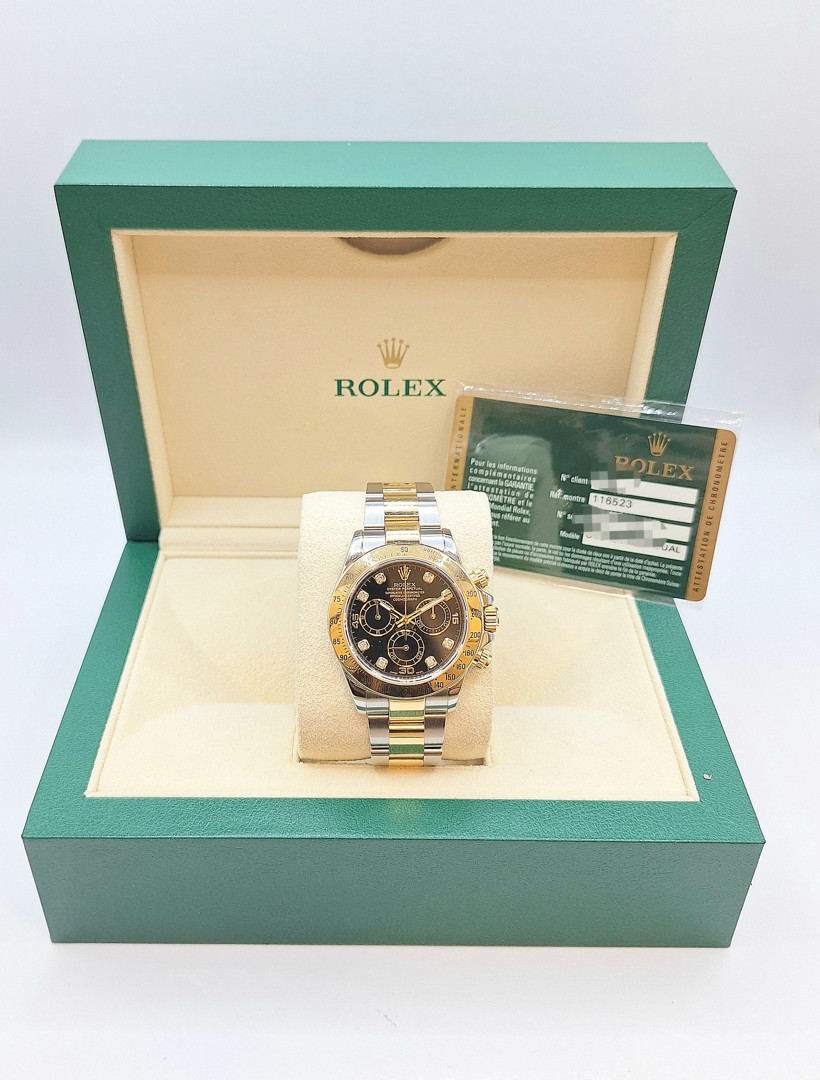 Cronografo acciaio e oro Rolex Daytona con scatola e garanzia a corredo
