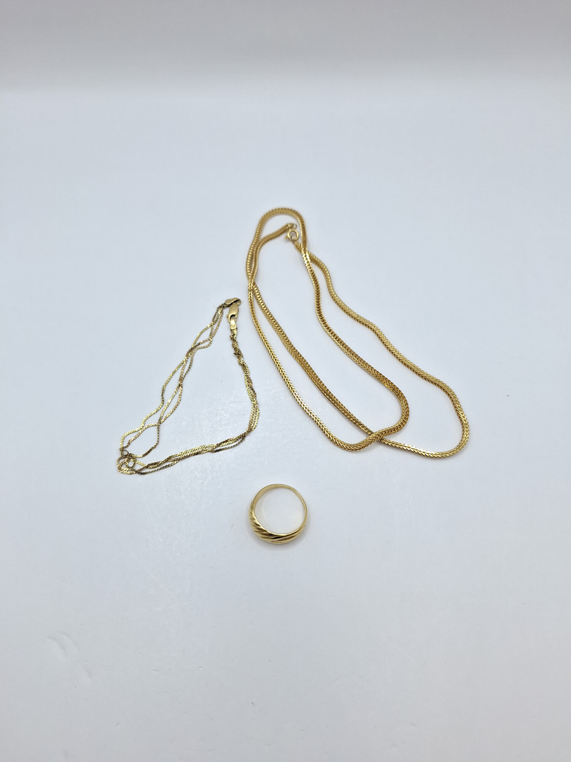 Collana bracciale e anello in oro 