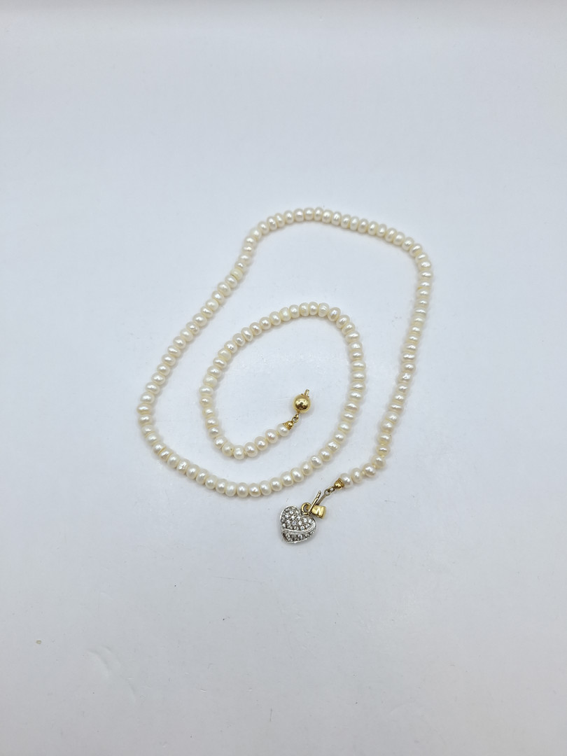 Collana e ciondolo perle oro diamanti