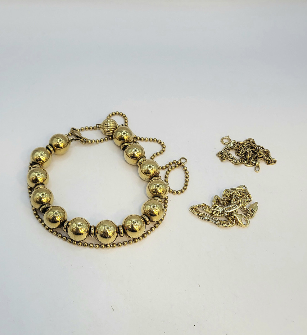 Collana e tre braccialetti oro 