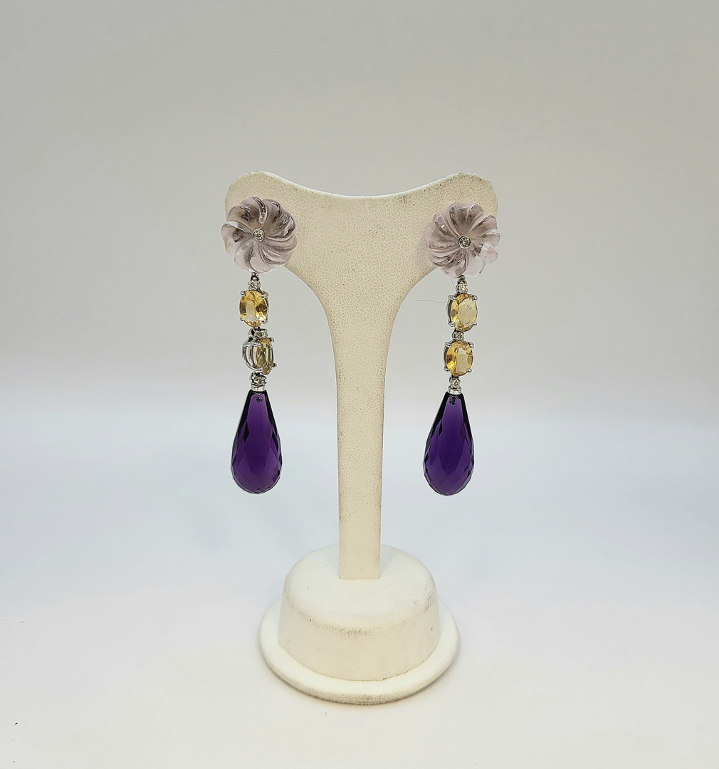 Paio orecchini oro diamanti pietre