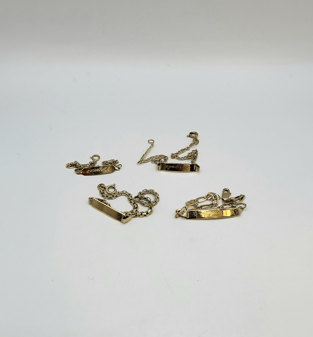 Quattro bracciali oro