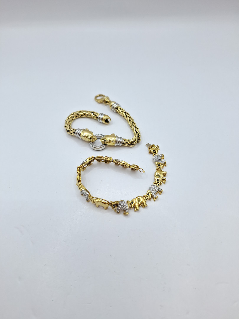 Due bracciali oro diamantini pietre 