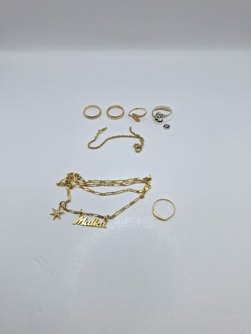 Vari oggetti in oro argento pietre 