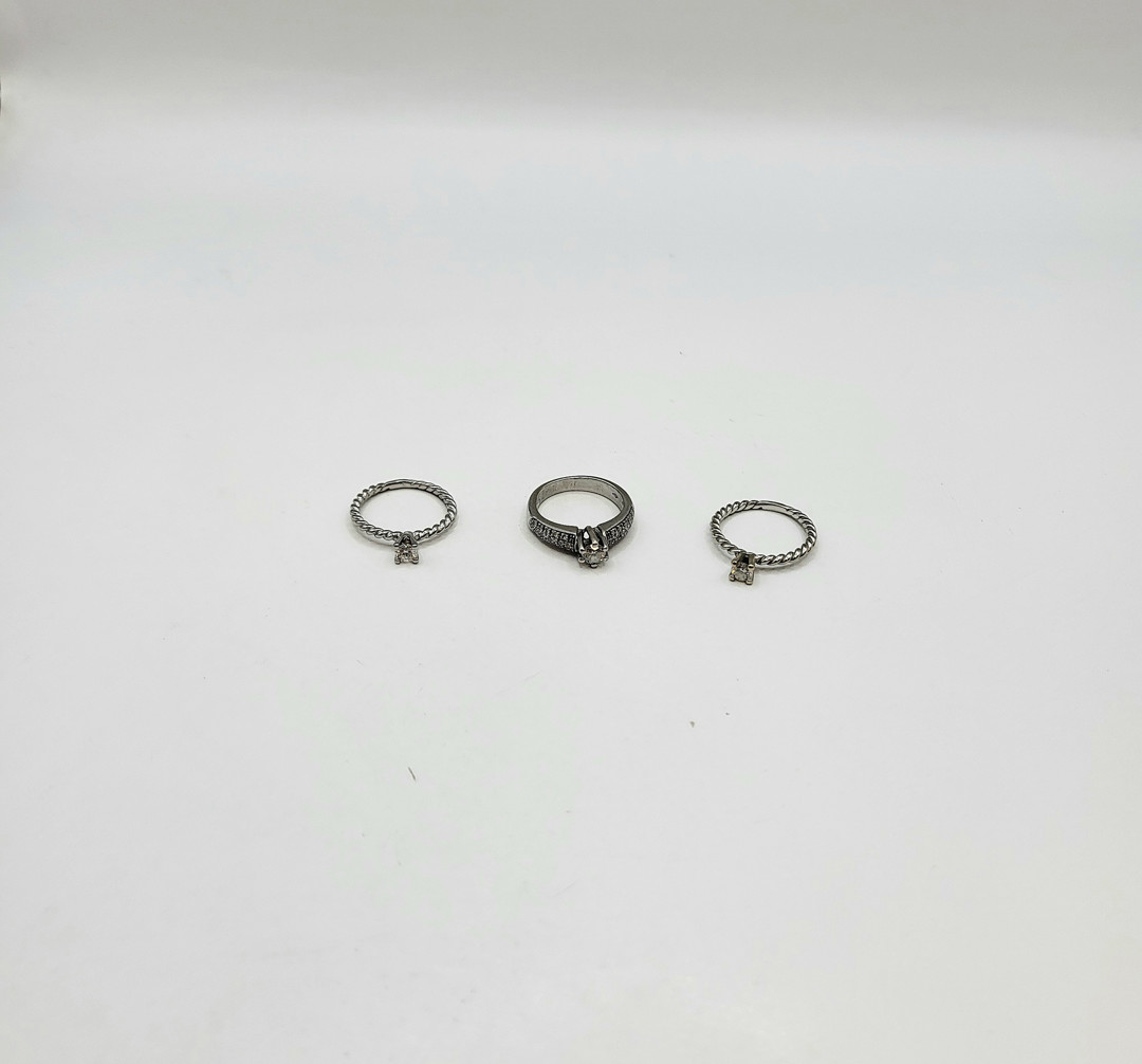 Tre anelli oro diamantini