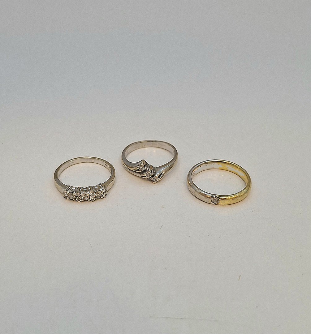 Tre anelli oro diamantini