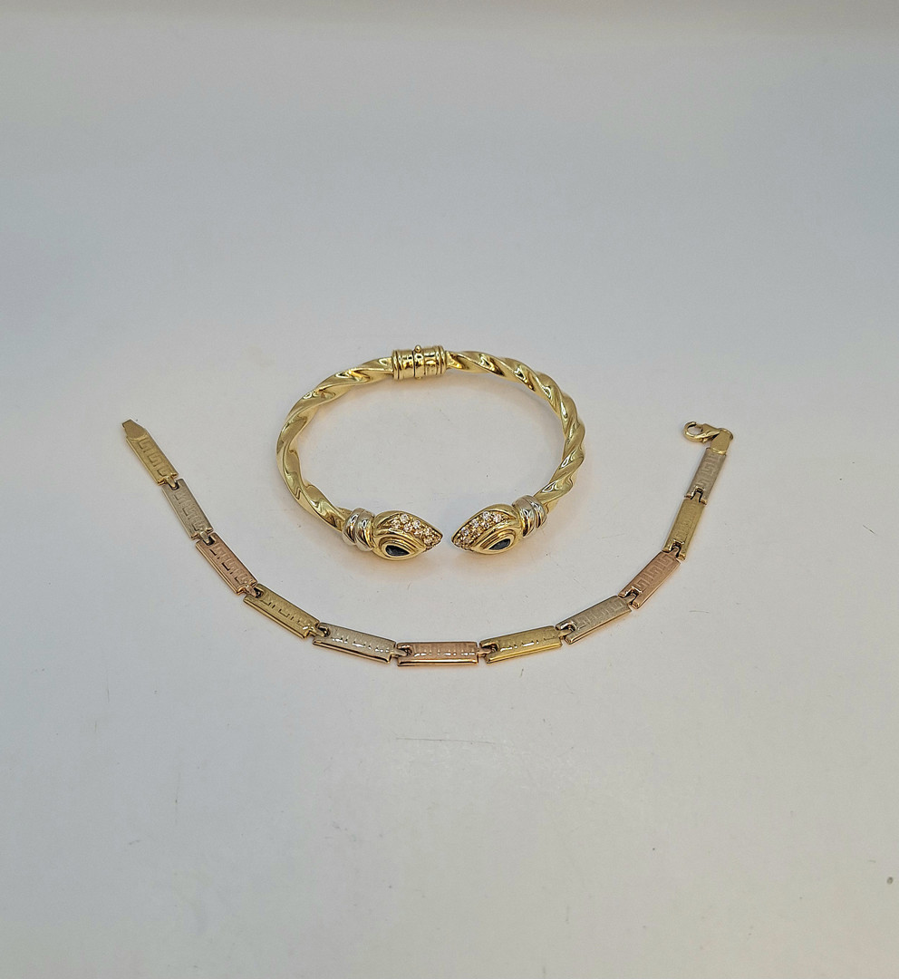 Due bracciali oro pietre 