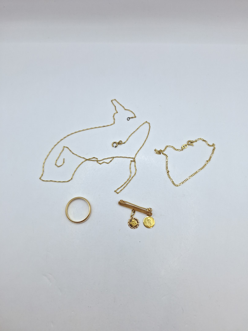 Collana bracciale anello spilla in oro 